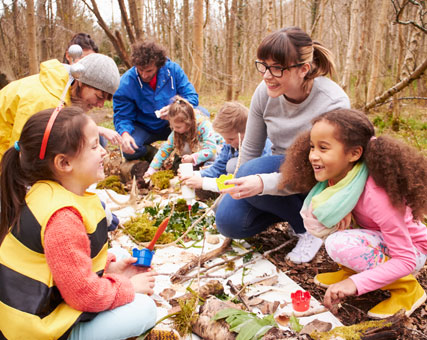 Photo of teachers and students. Link to Gifts of Cash, Checks, and Credit Cards