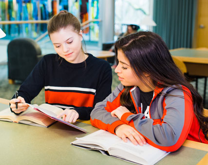 Photo of students studying. Link to Gifts of Appreciated Securities