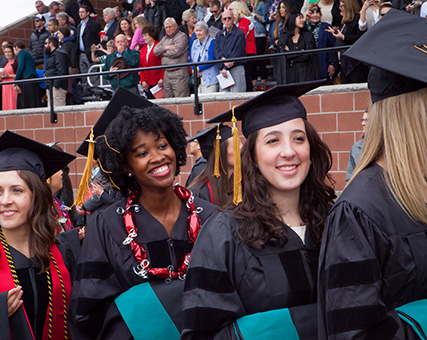 Group of students in graduation. Links to Beneficiary Designations Group of students in graduation. Links to Beneficiary Designations